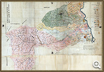 開田状況や集落状況を赤、緑、黄色などの色別で記された、上伊澤地区の地図絵画の写真